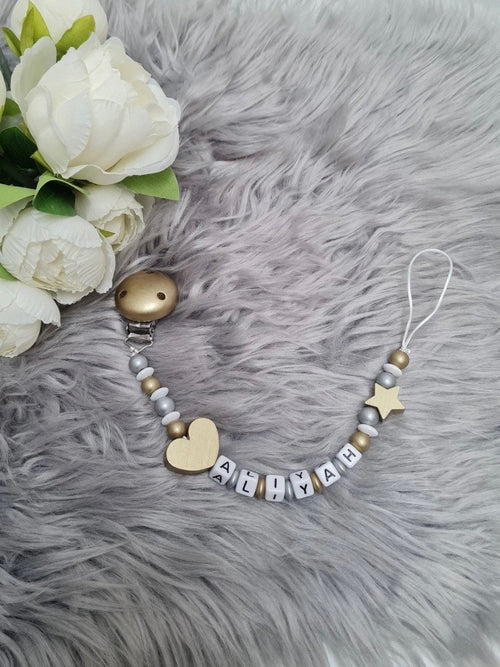 Attache tétine silver gold