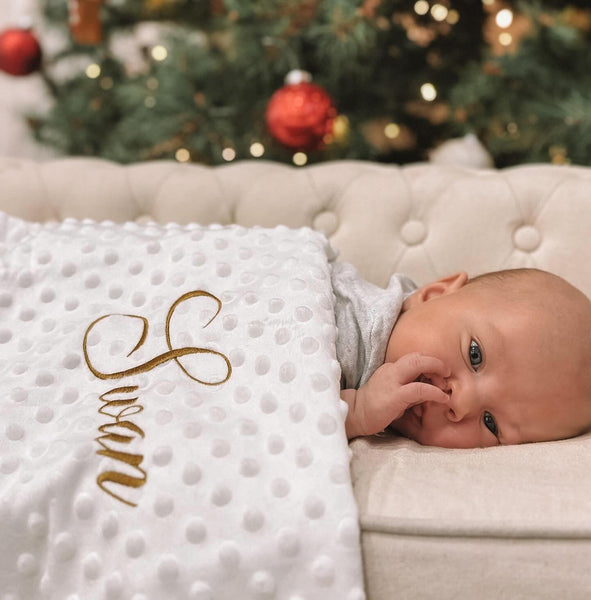 5 Idées de Cadeaux de Naissance Personnalisés Qui Feront Craquer les Parents