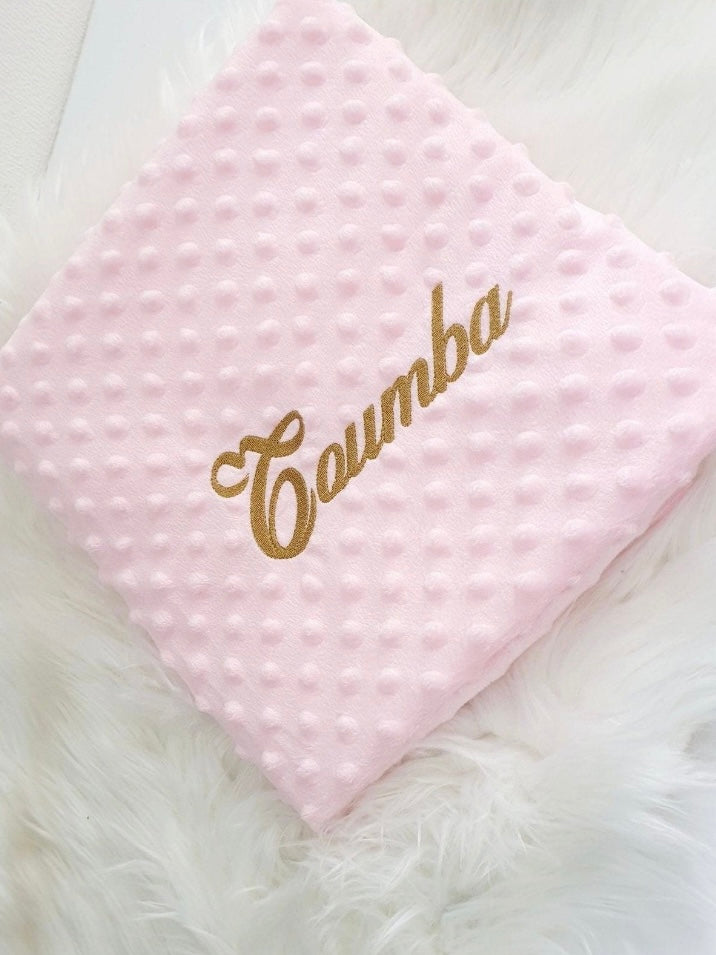 Pink blanket with gold embroidery