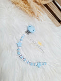 Blue pacifier clip