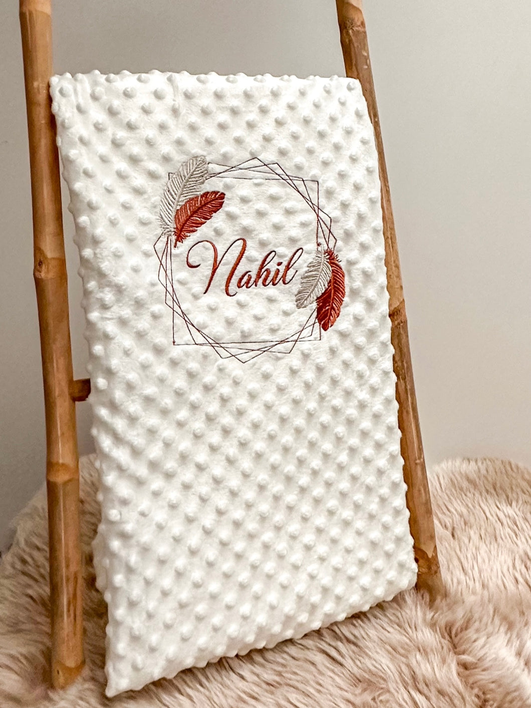 Feather patterned blanket