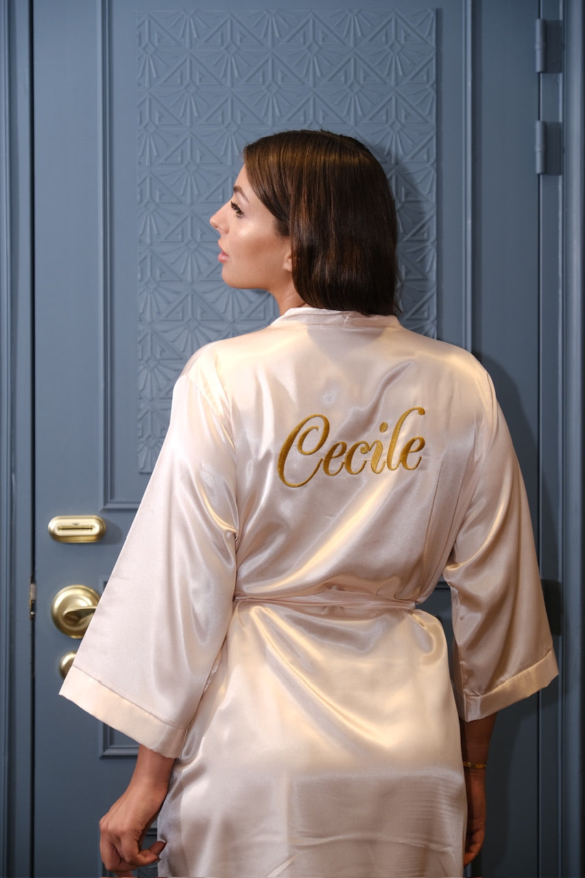 Champagne-colored satin bathrobe